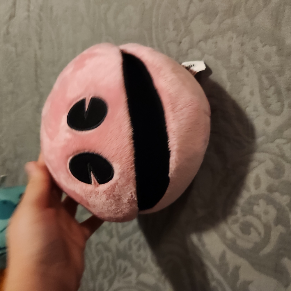 Pink Plush Toy with Black Details